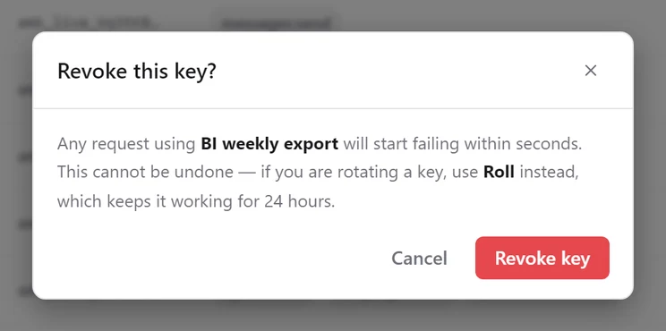 The Revoke this key? dialog for the BI weekly export key, with Cancel and Revoke key buttons