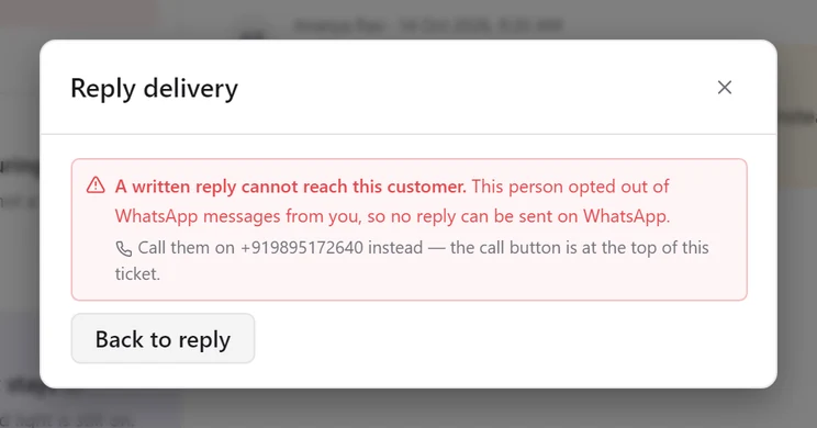 The Reply delivery dialog saying a written reply cannot reach this customer because they opted out of WhatsApp messages, and suggesting a call on their number instead